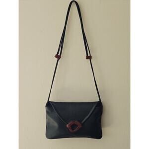 Hand Carved Medium Lip Bag by artist Kimberly Chalos ONE OF A KIND